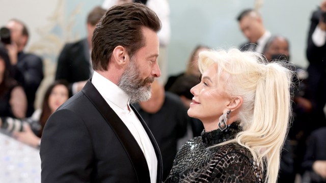 Hugh Jackman and Deborra-Lee Furness' profiles as they stare at each other on the Met Gala carpet