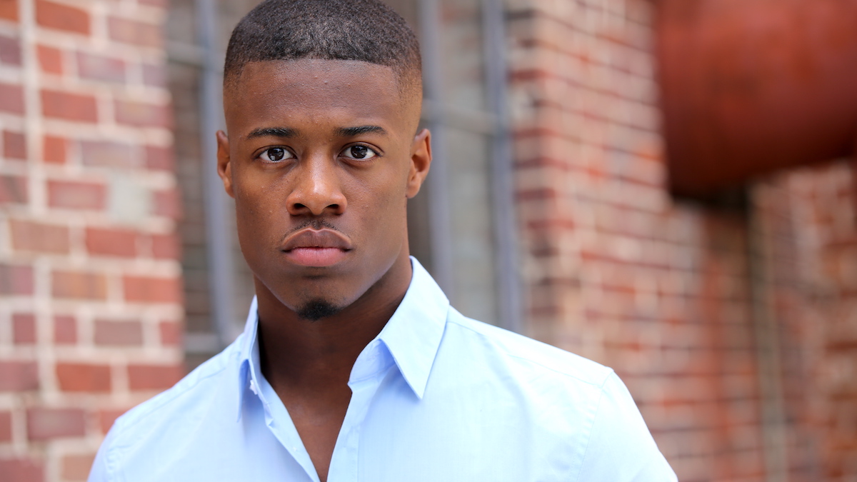 A headshot of actor Patrick Walker