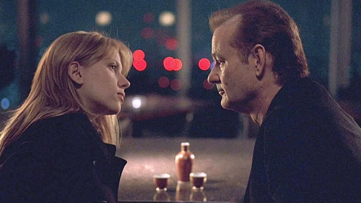 Scarlett Johansson and Bill Murray looking intensely at each other during a scene in the 2003 Sofia Coppola film 'Lost in Translation'.