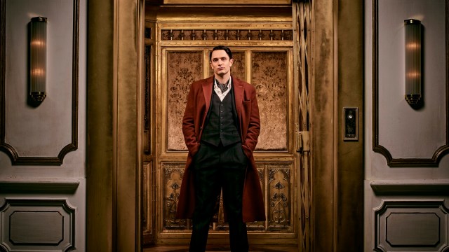 Winston (Colin Woodell) stands in an elevator in a promotional image for 'The Continental.'