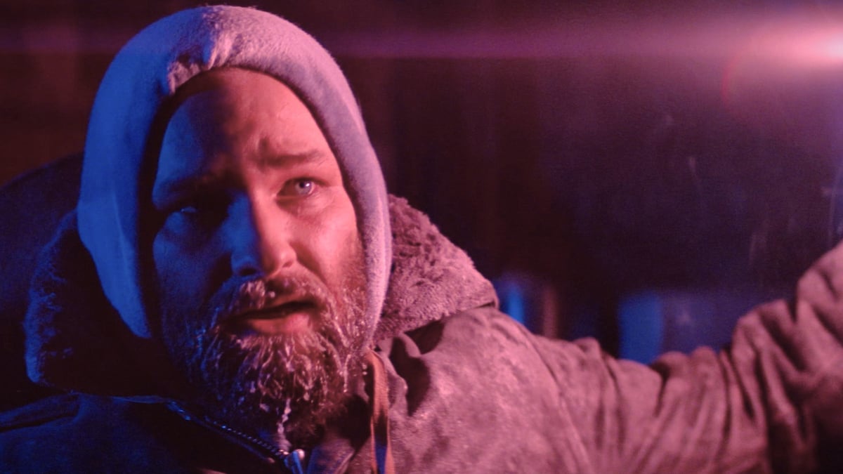 Kurt Russell looking off-screen in 'The Thing'