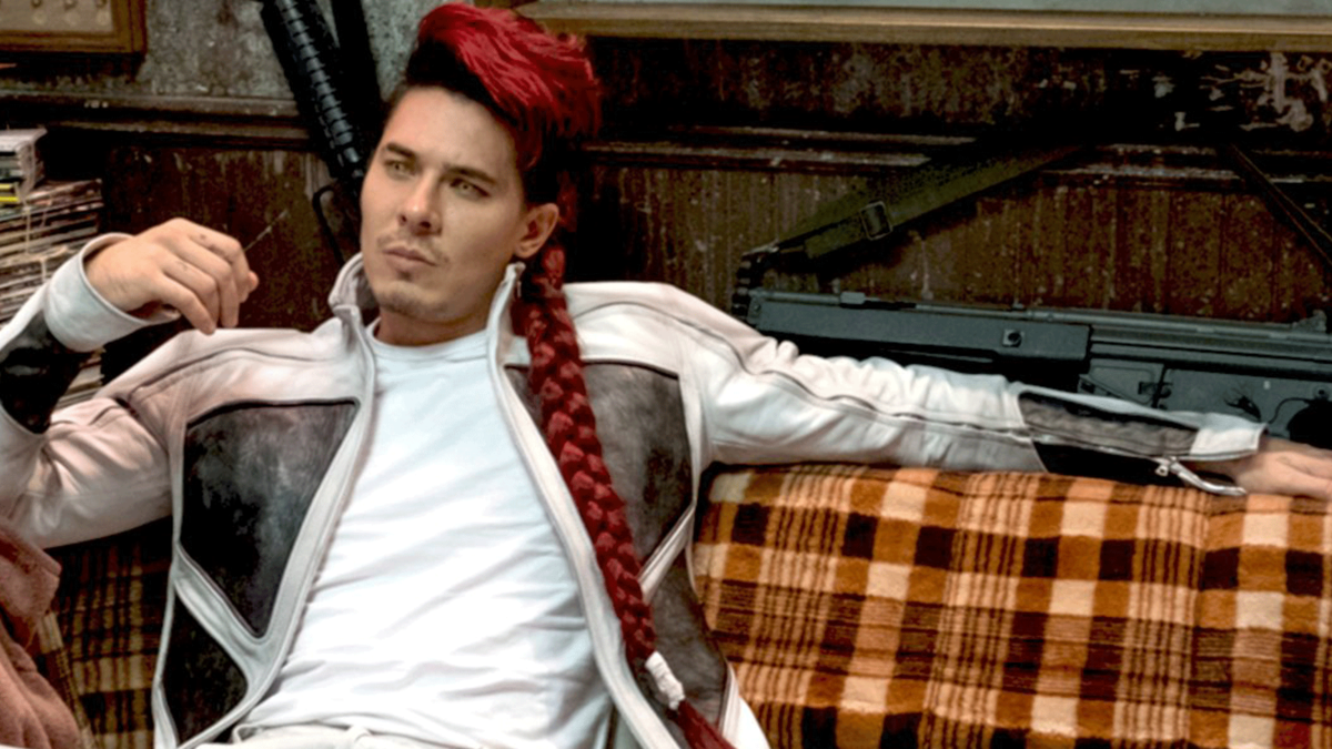 Shatterstar (Lewis Tan) poses on a sofa in 'Deadpool 2' 