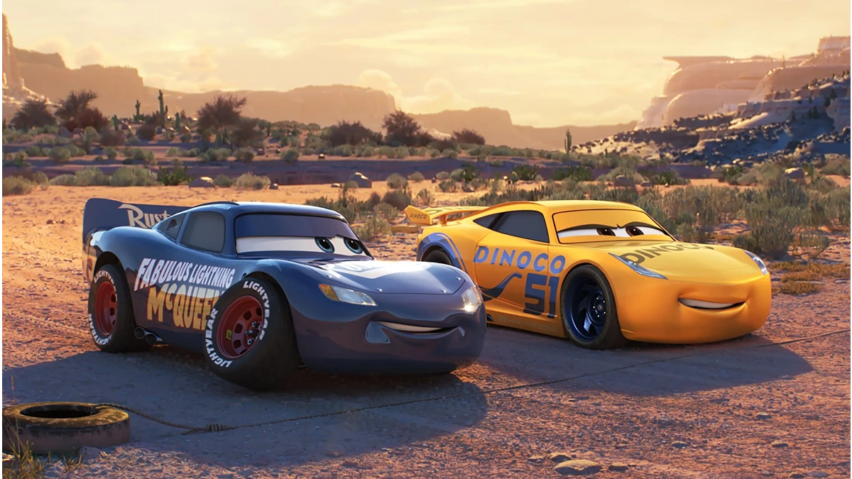 Cruz Ramirez and another car are looking forward in Cars 3.