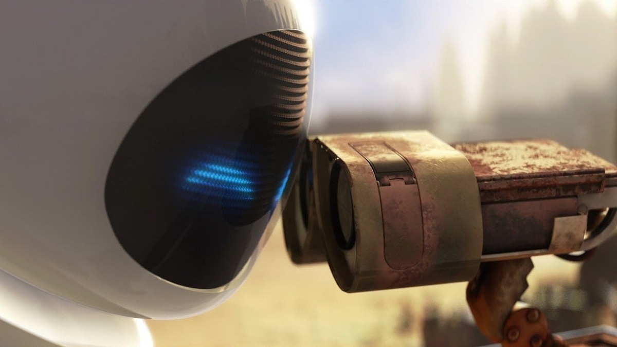 Wall-E and Eve are looking at each other intently. 