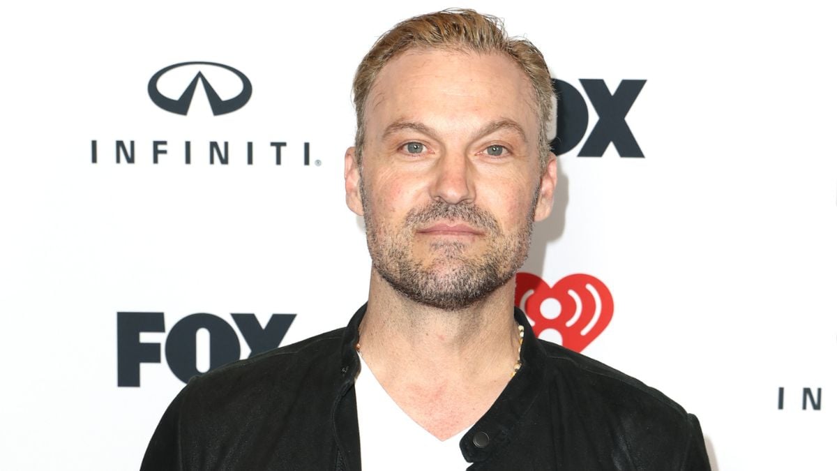 Brian Austin Green poses at a red carpet event.