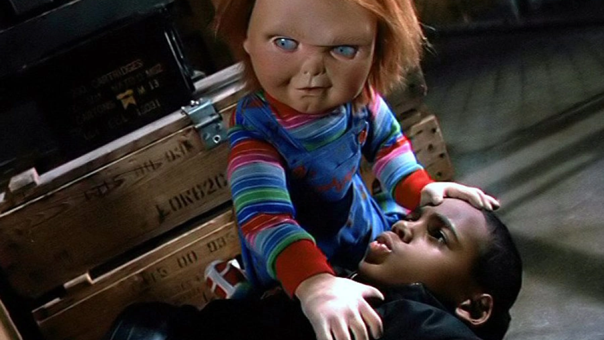 Tyler being held down by Chucky in 'Child's Play 3'
