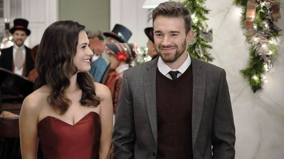 lyndsy fonseca and chandler massey share a sweet moment in Hallmark movie 'Next Stop, Christmas'