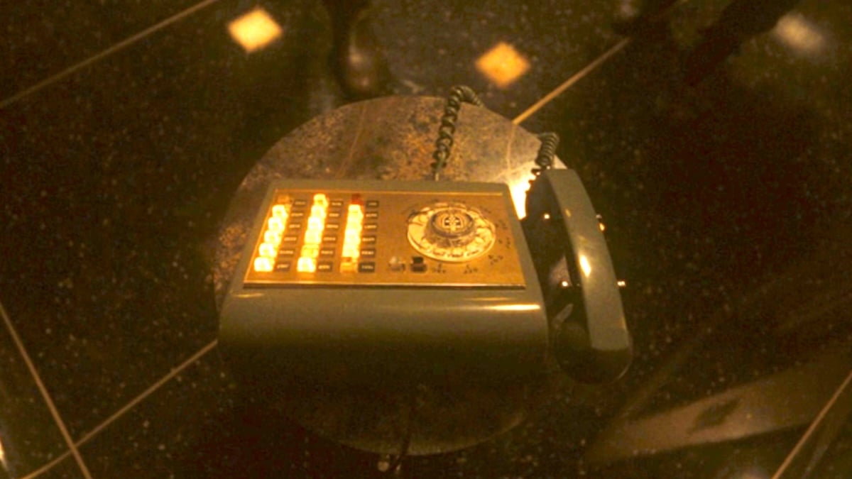 A downward shot of the mysterious ringing phone from Loki season 2