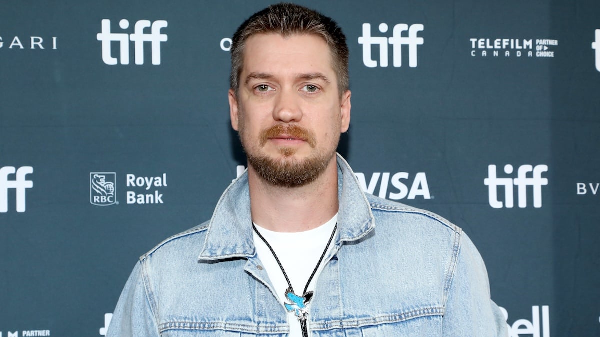 Rafael Casal wearing a denim jacket over a white shirt at the "Wildcat" premiere during the 2023 Toronto International Film Festival at Royal Alexandra Theatre