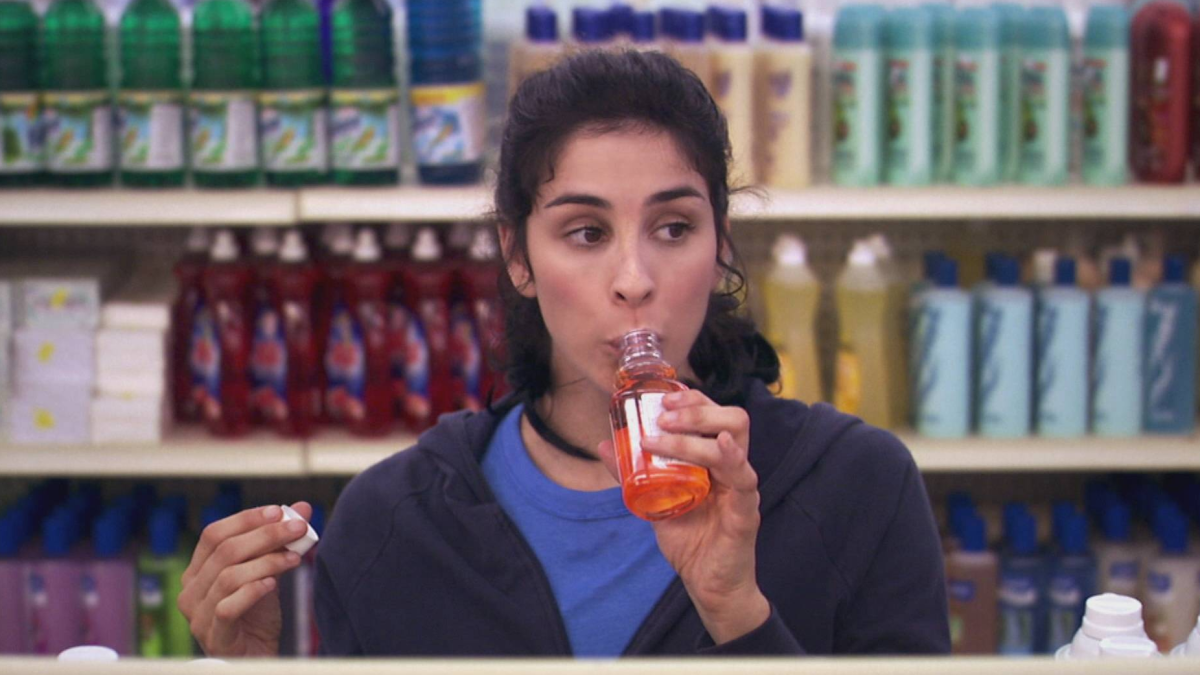 Sarah Silverman drinking cold medicine