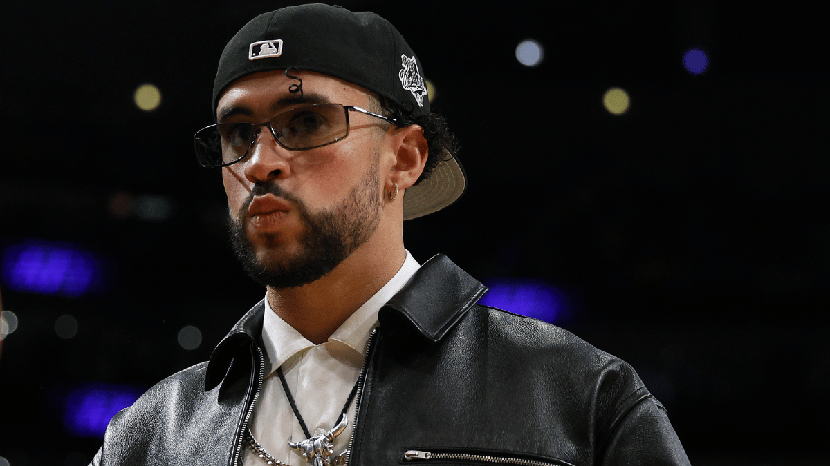 Rapper Bad Bunny walks courtside during the game between the Golden State Warriors and the Los Angeles Lakers in game six of the Western Conference Semifinal Playoffs at Crypto.com Arena on May 12, 2023 in Los Angeles, California.