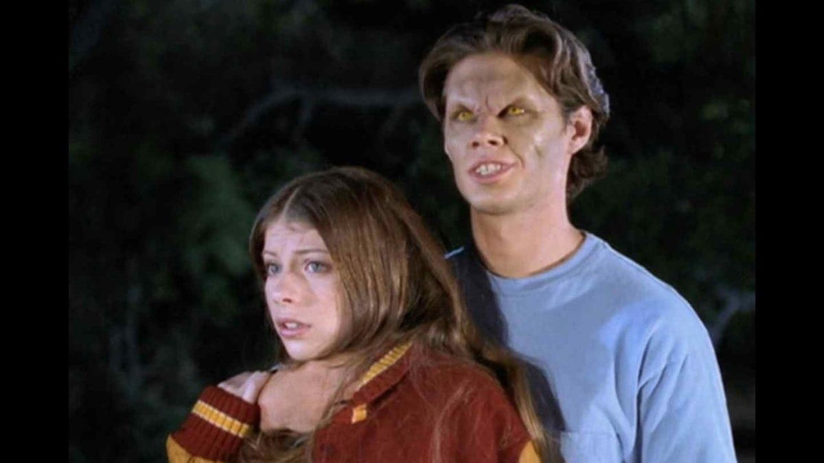 Dawn (Michelle Tractenberg) is held by the throat by a vampire in 'Buffy the Vampire Slayer' episode "All the Way."