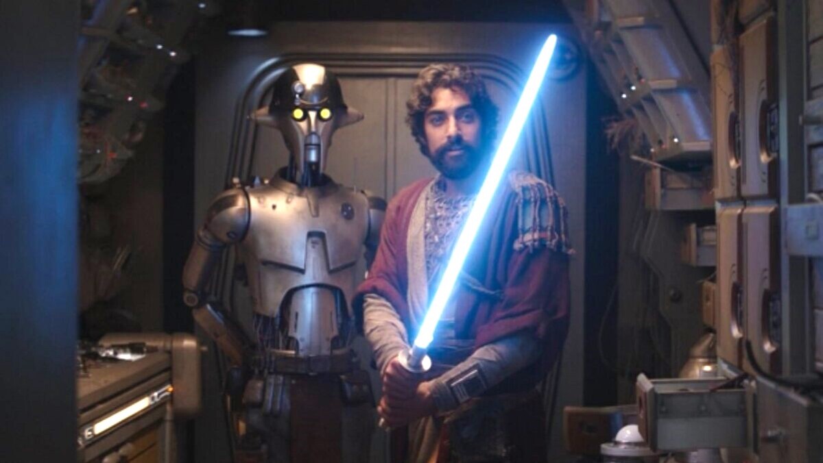Ezra Bridger wields his new lightsaber as Huyang the droid stands next to him in 'Ahsoka' episode 8
