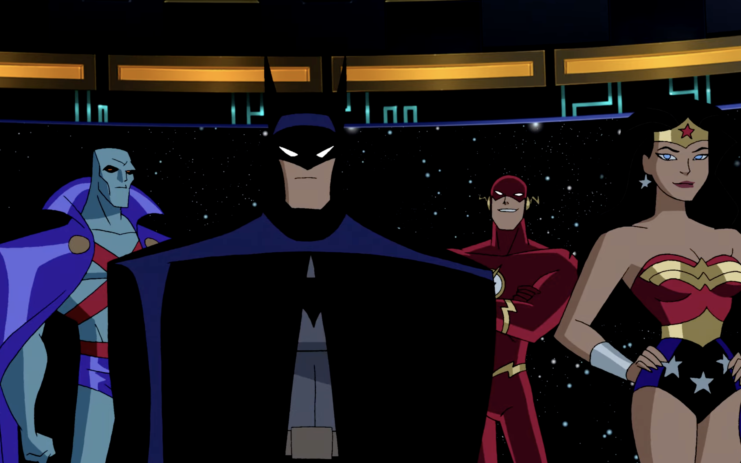Batman is standing with Wonder Woman and The Flash.