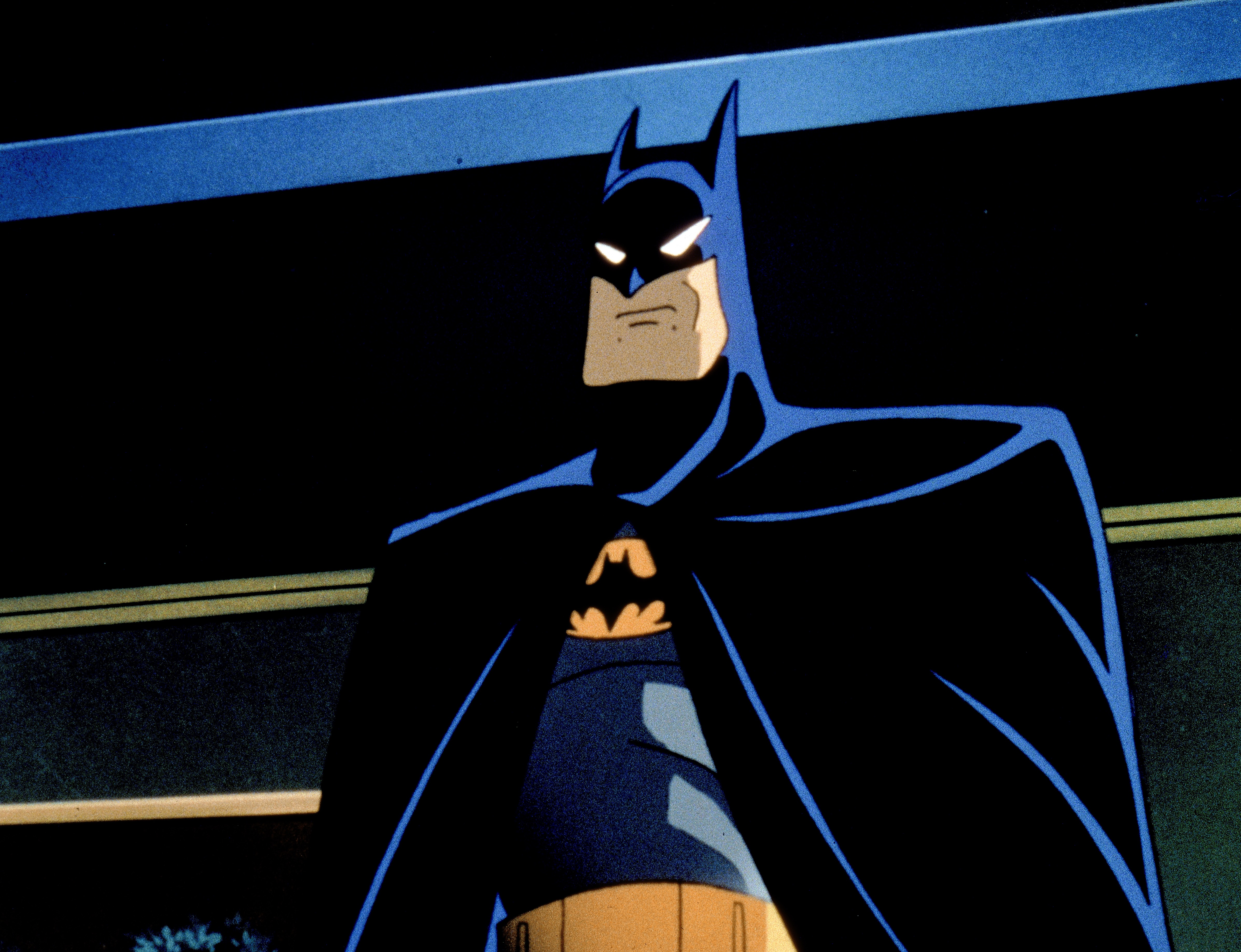 Batman is looking into the distance in Mask of the Phantasm. 