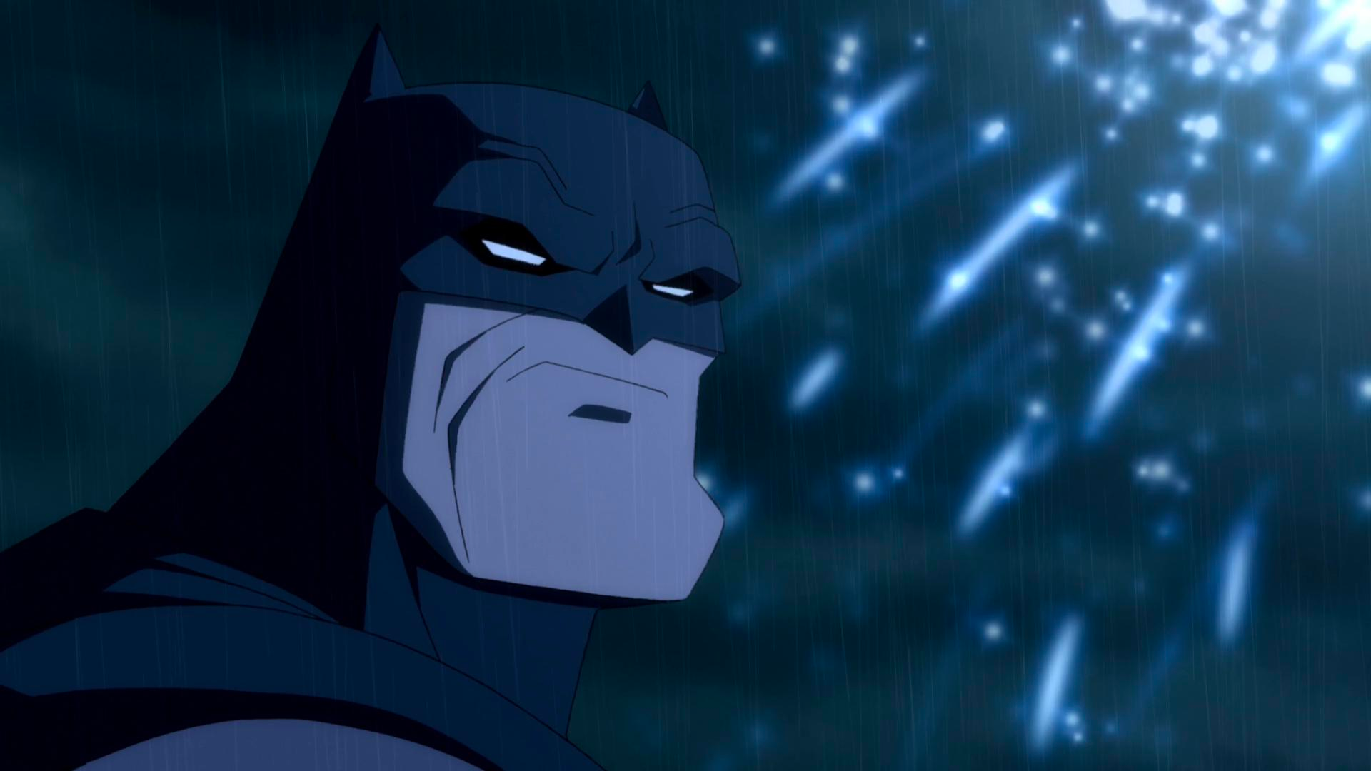 Batman looks angry at night in Dark Knight Returns.
