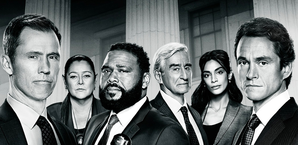 The cast of Law & Order is seen in black and white. 