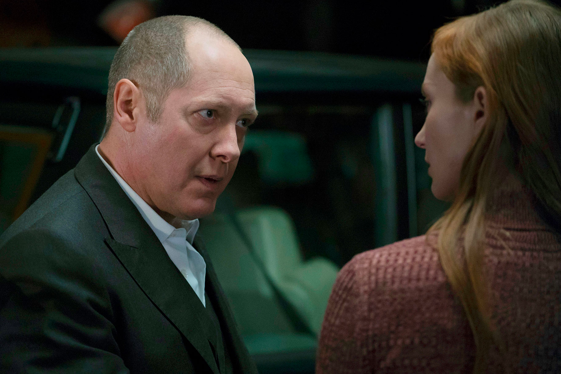 Red is talking to a woman on "The Blacklist".