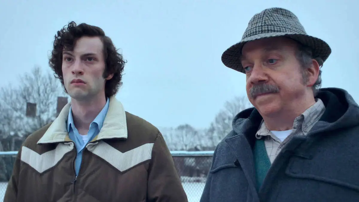 Dominic Sessa and Paul Giamatti as Angus Tully and Paul Hunham in 'The Holdovers'.