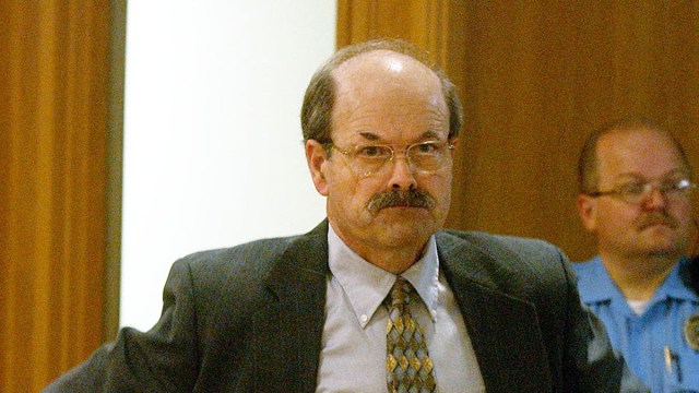 Dennis Rader, the admitted BTK serial killer, sits in court on the first day of his sentencing at the Sedgwick County Courthouse August 17, 2005 in Wichita, Kansas. Rader, of Park City, Kansas, has pleaded guilty to 10 killings dating back to 1974.