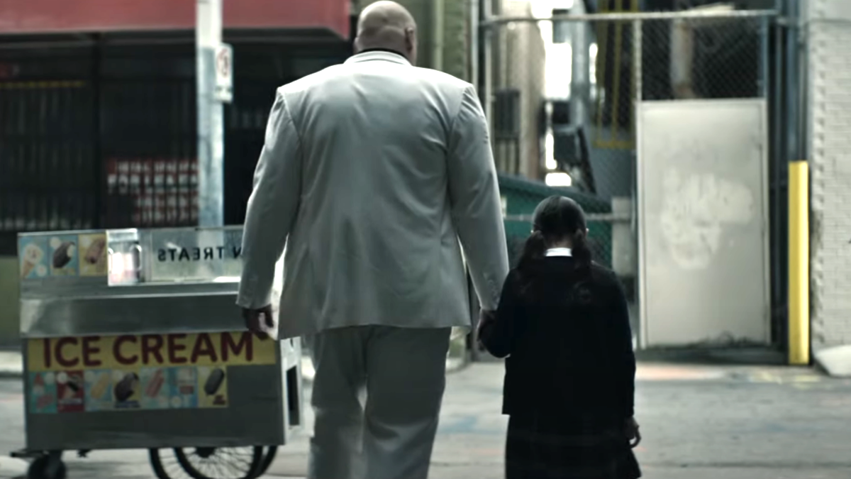 Kingpin and Young Maya walk hand in hand on New York's ally from behind in the 'Echo' trailer.