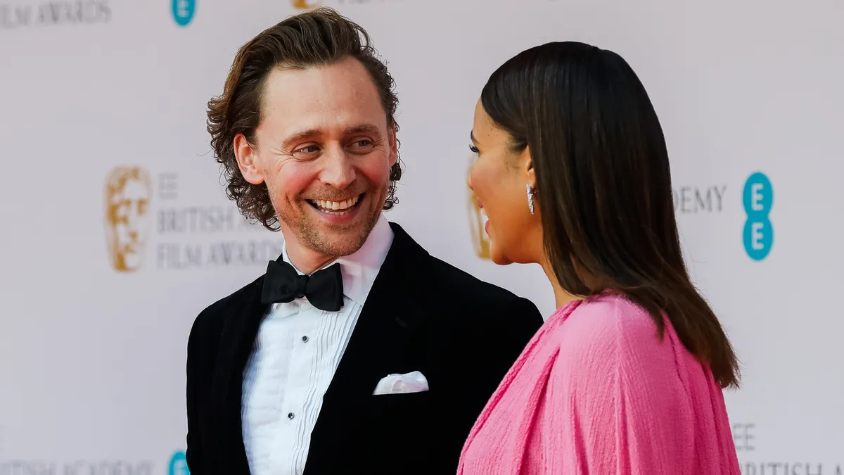 Tom Hiddleston and Zawe Ashton attends the EE British Academy Film Awards 2022 at Royal Albert Hall on March 13, 2022 in London, England. 