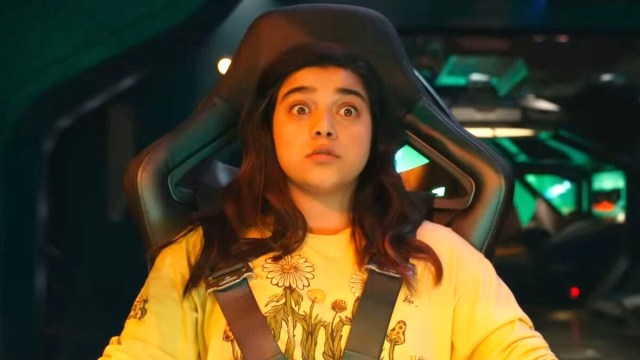 Kamala Khan looks shocked while strapped into Captain Marvel's spaceship in The Marvels.