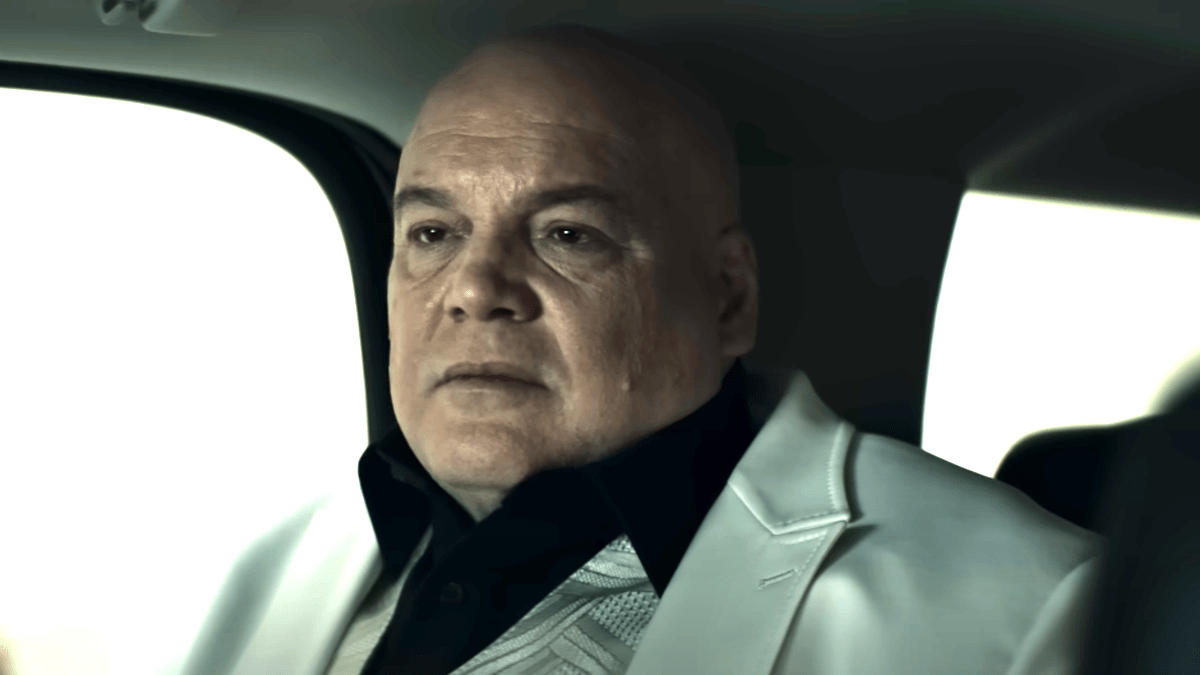 Wilson Fisk/Kingpin watches from the back seat of a car in the 'Echo' trailer.