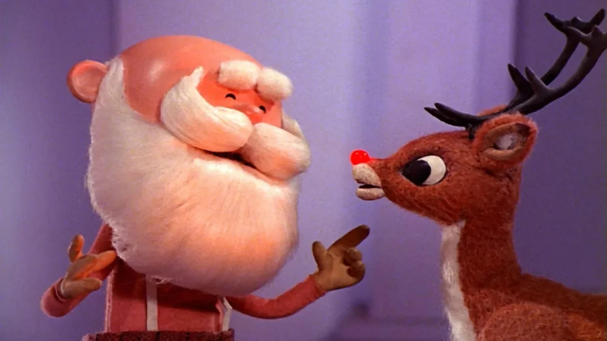 Rudolph the Red-Nosed Reindeer talking to Santa Claus