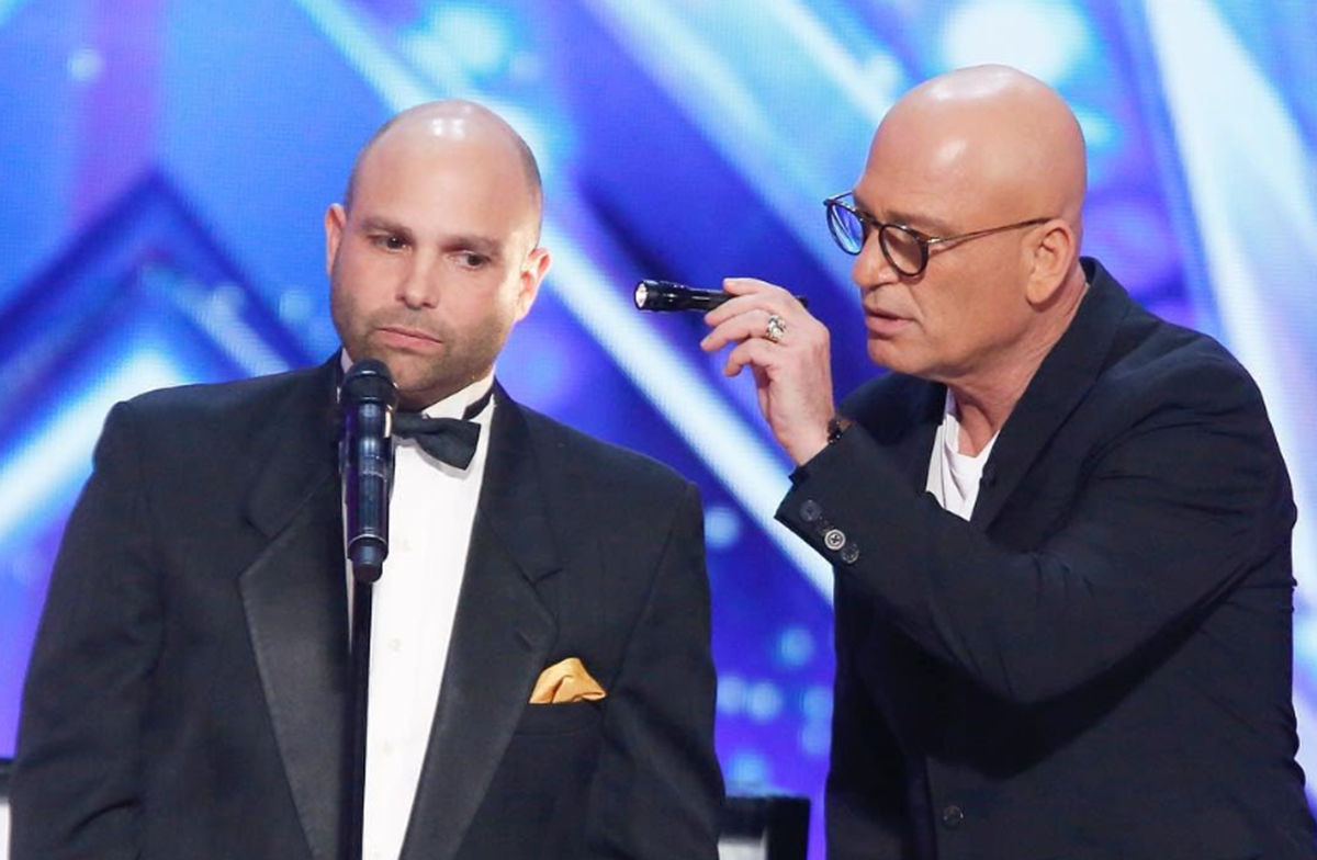 Howie Mandel (r) with a contestant during America's Got Talent auditions
