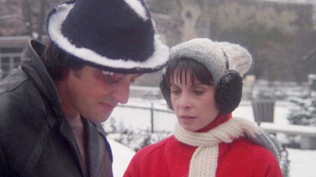 Rocky and Adrian standing in the snow in 'Rocky 2'