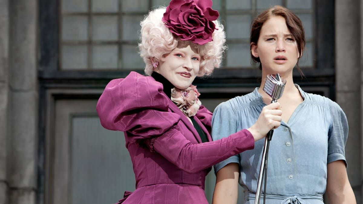 Katniss and Effie Trinket in The Hunger Games reaping