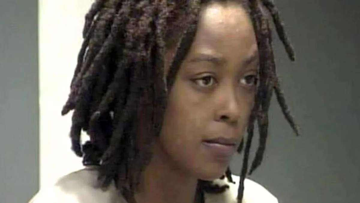 A close-up of Antoinette Davis in custody, moments before her court appearance.
