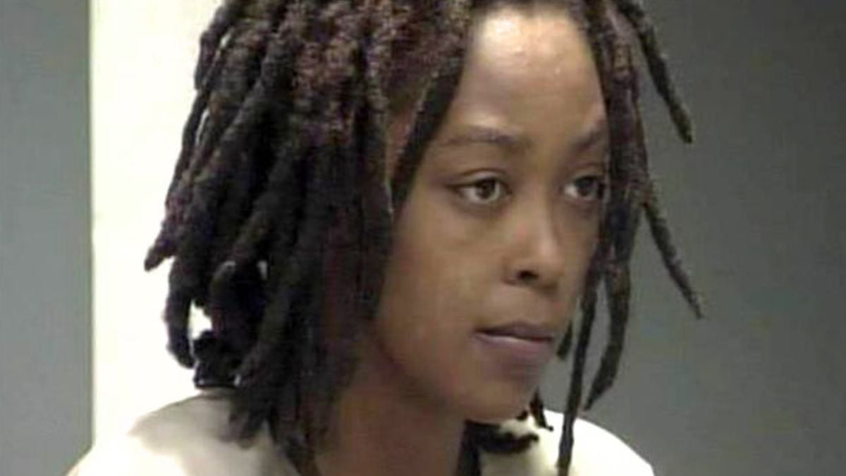 A close-up of Antoinette Davis in custody, moments before her court appearance.