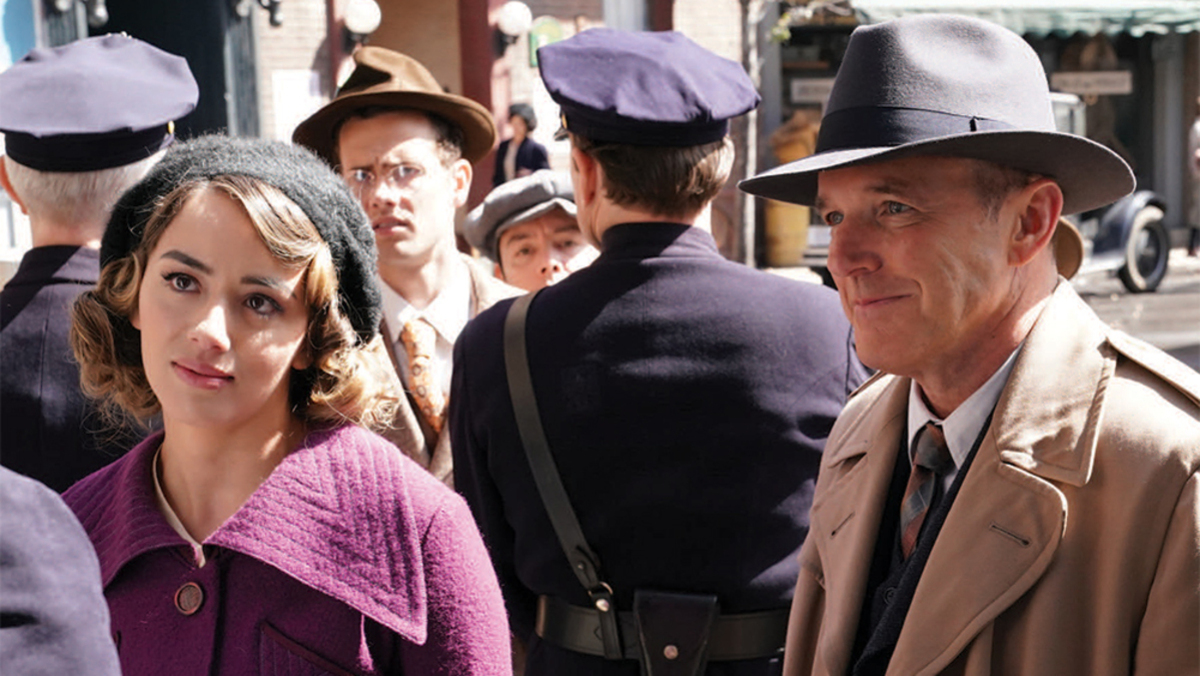 Chloe Bennet as Daisy Johnson and Clark Gregg as Phil Coulson dress in 1940s period garb in 'Agents of S.H.I.E.L.D.' season 7 episode 1. 
