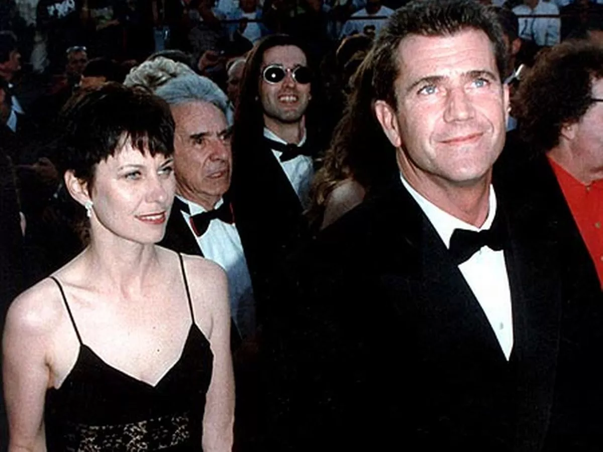 Robyn and Mel Gibson are standing together at an event. 