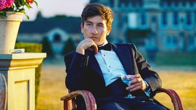 Still of Barry Keoghan in a suit on the film "Saltburn"