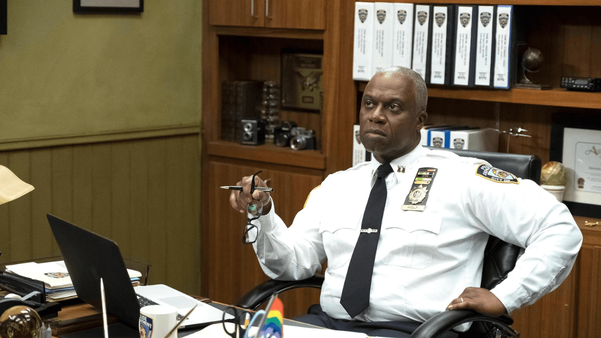 Captain Holt sitting at desk