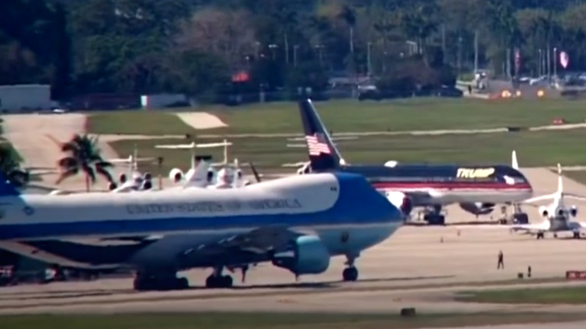 Air Force One and Trump Force One, smushed next to each other.