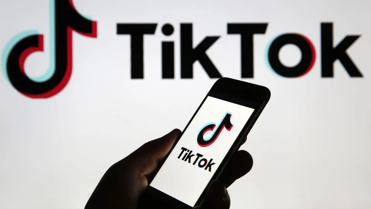 In this photo illustration the logo of Chinese media app for creating and sharing short videos TikTok, also known as Douyin is displayed on the screen of a smartphone on September 18, 2020 in Paris, France. The United States on Friday announced a ban on downloading TikTok and WeChat apps, which are very popular with young people, from Sunday, with the two Chinese apps facing accusations of spying for the benefit of China. (Photo Illustration by Chesnot/Getty Images)