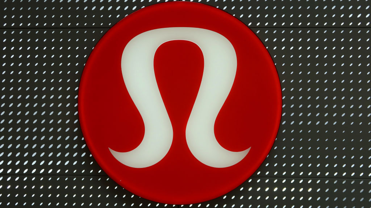 A Lululemon corporate logo hangs on the wall of their store in the Garden State Plaza Mall on November 4, 2023, in Paramus, New Jersey 
