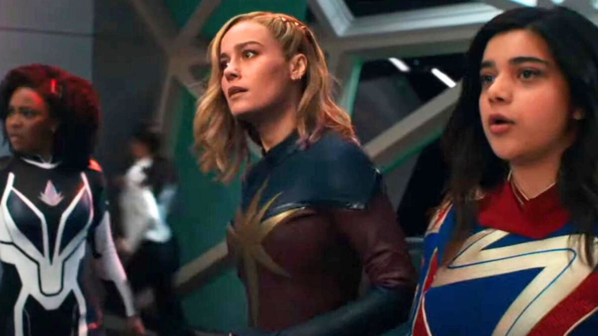 Monica Rambeau, Captain Marvel, and Ms. Marvel stand side by side in The Marvels