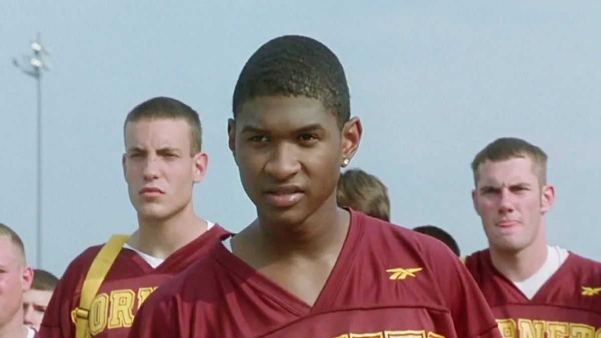 Usher as high school a football player in 'The Faculty.'