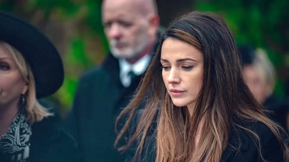 Maya Stern (Michelle Keegan) attends her husband's funeral in Netflix's Fool Me Once