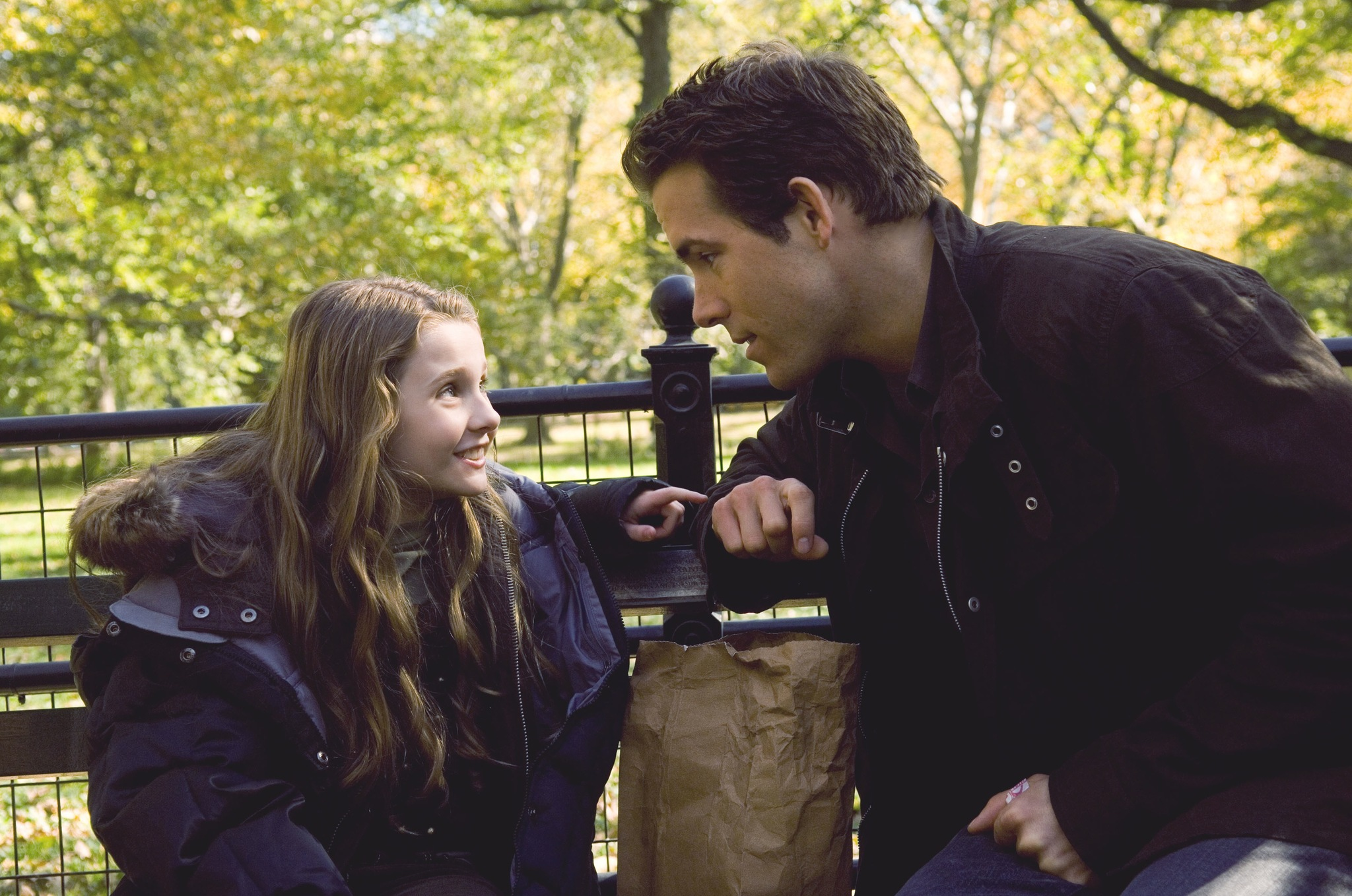 Will is talking his daughter in a park in Crazy, Stupid, Love.