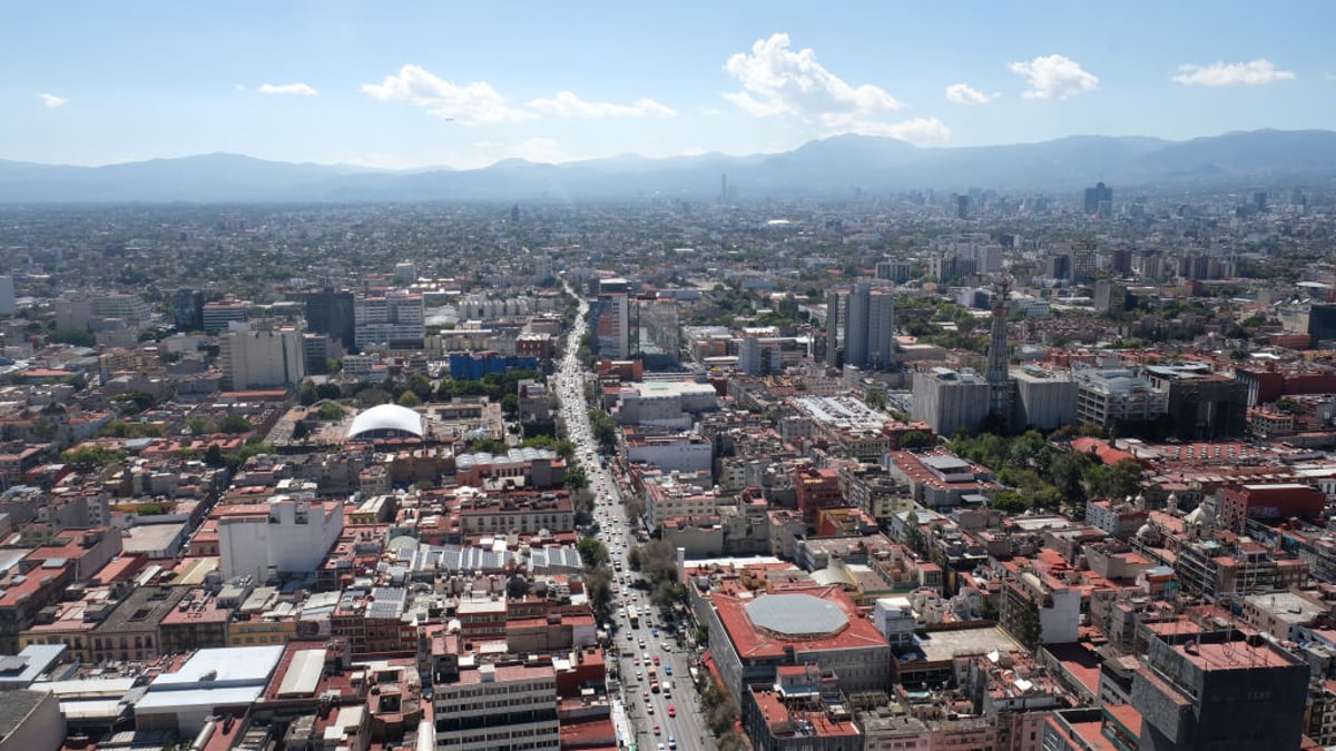 The city skyline observed from Latin American Tower or Torre Latinoamericana skyscraper in the historic city center on January 3, 2023 in Mexico City, Mexico. 