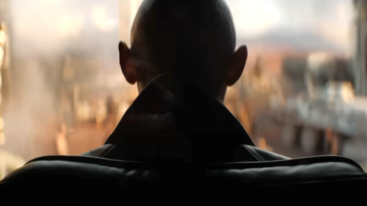 A bald-headed person looks over the wastelands in the Deadpool & Wolverine trailer