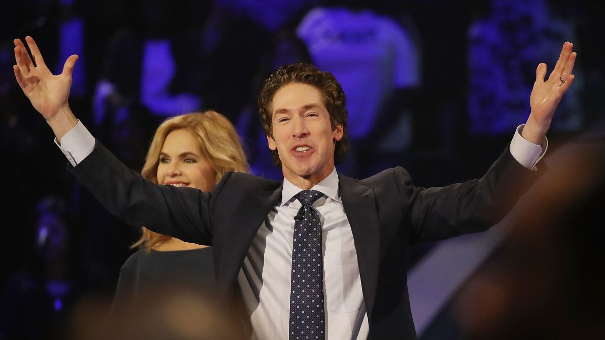 oel Osteen, the pastor of Lakewood Church, stands with his wife, Victoria Osteen, as he conducts a service at his church as the city starts the process of rebuilding after severe flooding during Hurricane and Tropical Storm Harvey on September 3, 2017 in Houston, Texas. Pastor Osteen drew criticism after initially not opening the doors of his church to victims of Hurricane Harvey. Harvey, which made landfall north of Corpus Christi on August 25, dumped around 50 inches of rain in and around areas of Houston and Southeast Texas. (Photo by Joe Raedle/Getty Images)