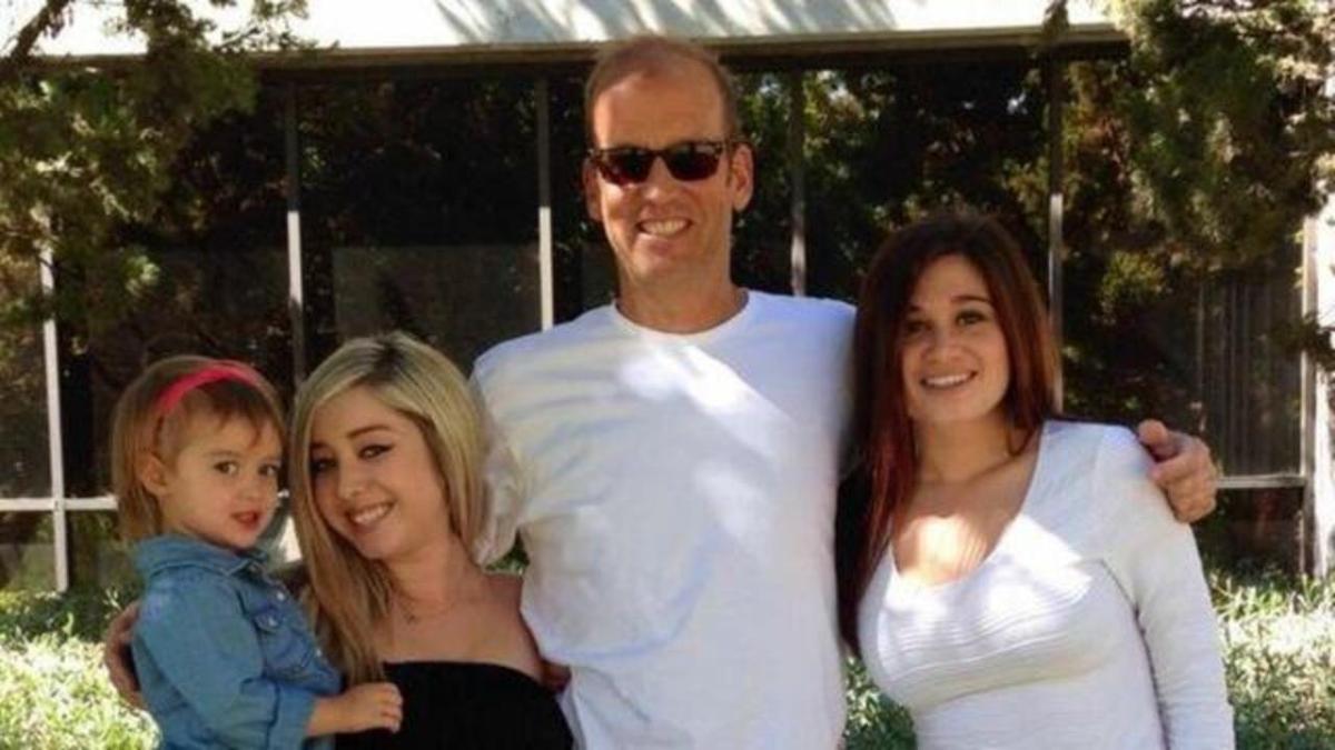 Abducted father Ray Wright with his two daughters and granddaughter
