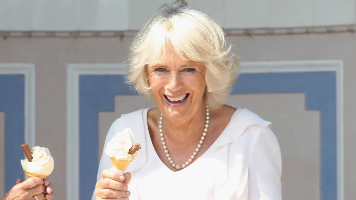 Dame Judi Dench and Camilla, Duchess of Cornwall enjoy an ice cream at Queen Victoria's private beach next to Osborne House during a visit to the Isle of Wight on July 24, 2018 in East Cowes, Isle of Wight, England. (Photo by Chris Jackson/Getty Images)